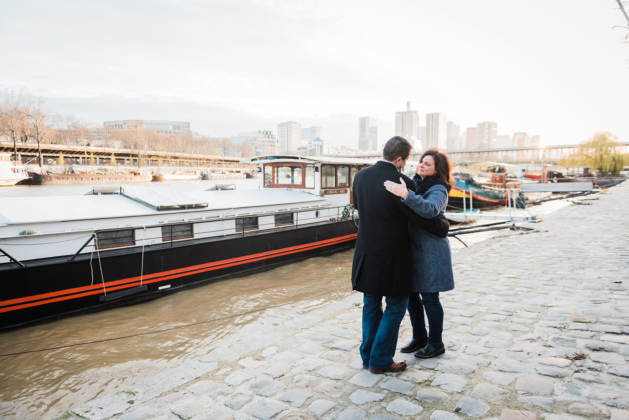 25th anniversary couples photography session by the seine river in Paris, France